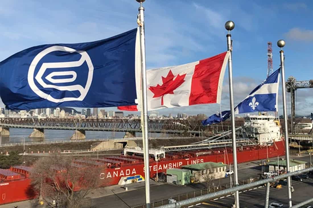 St. Lawrence, Canada, and Quebec flags.