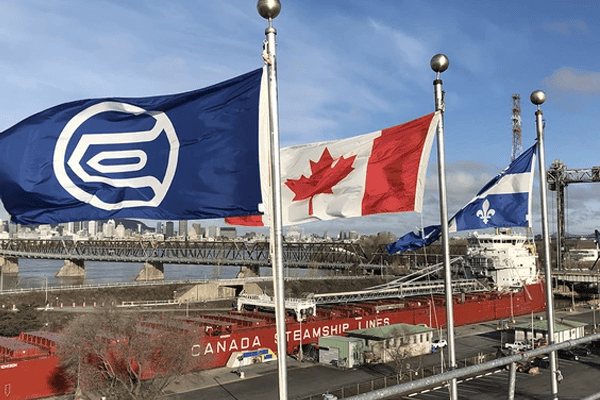 St. Lawrence, Canada, and Quebec flags.